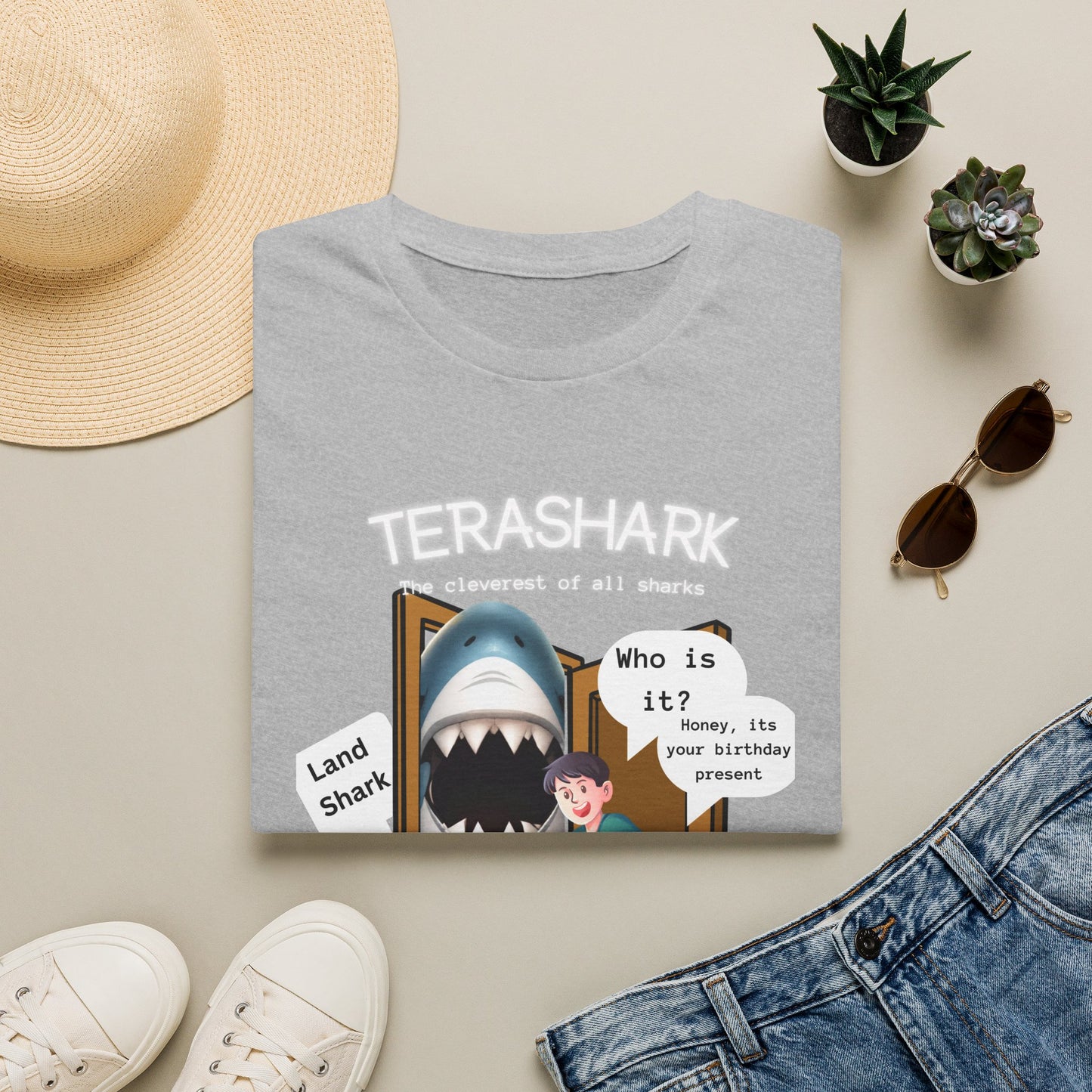 Tera Shark "Who is it?" Graphic T‑Shirt — Funny Birthday Surprise Tee
